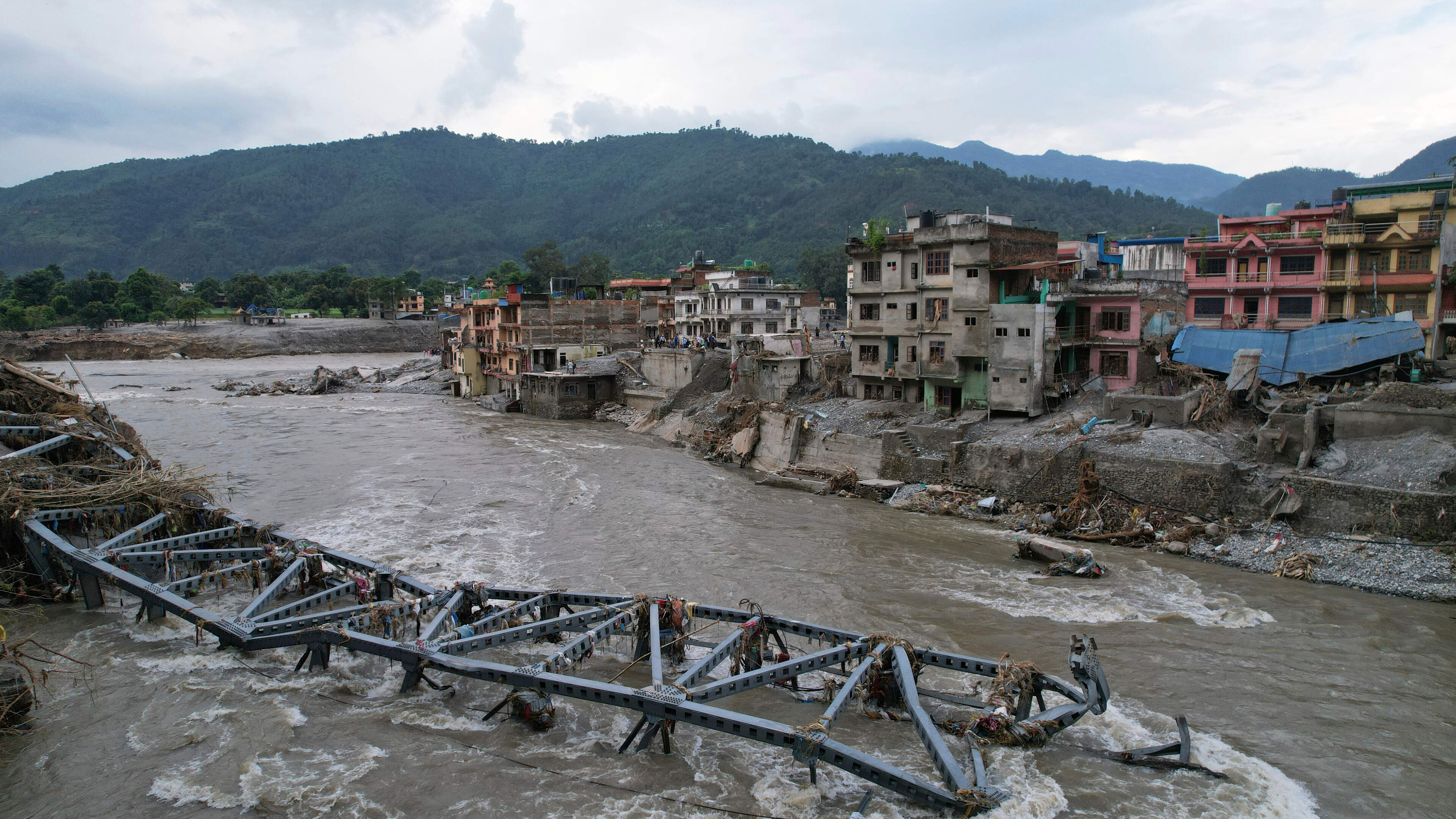 Flash flood death toll rises to 675 as Nepal rejects international search and rescue offers